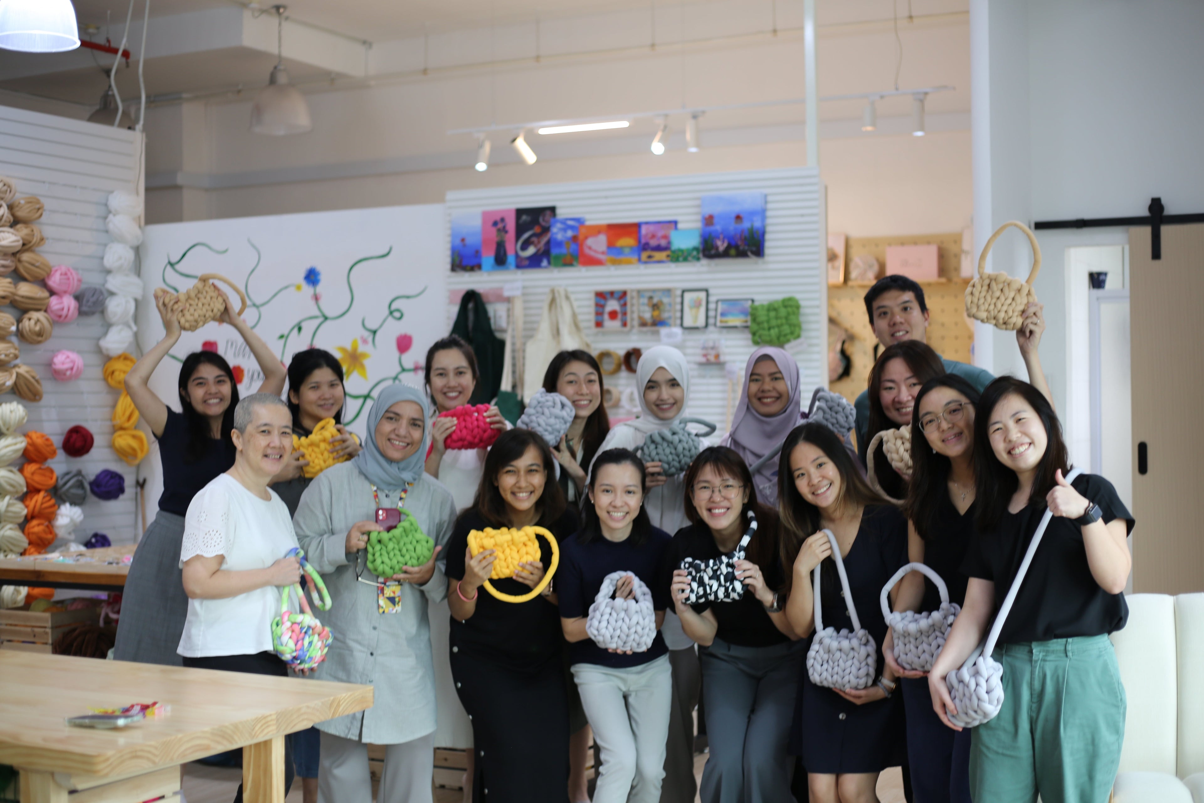 MOE Singapore staff participating in a creative hybrid craft team-bonding workshop at Crafts Collective studio